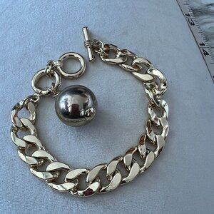 Chunky Gold-Tone Bracelet with Oversized Sphere Charm